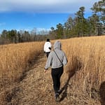 daughter hiking in field