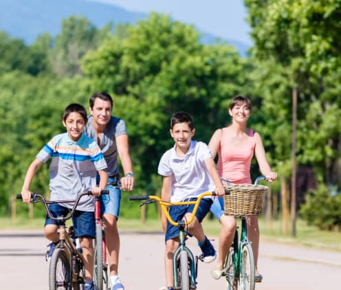 Active travel Family biking in the mountains.
