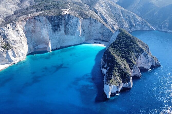 bright blue waters against white cliffs