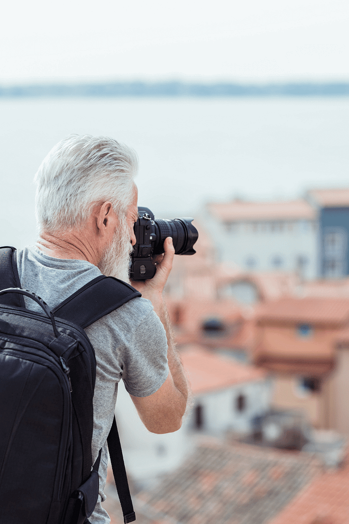 man taking photography of travel