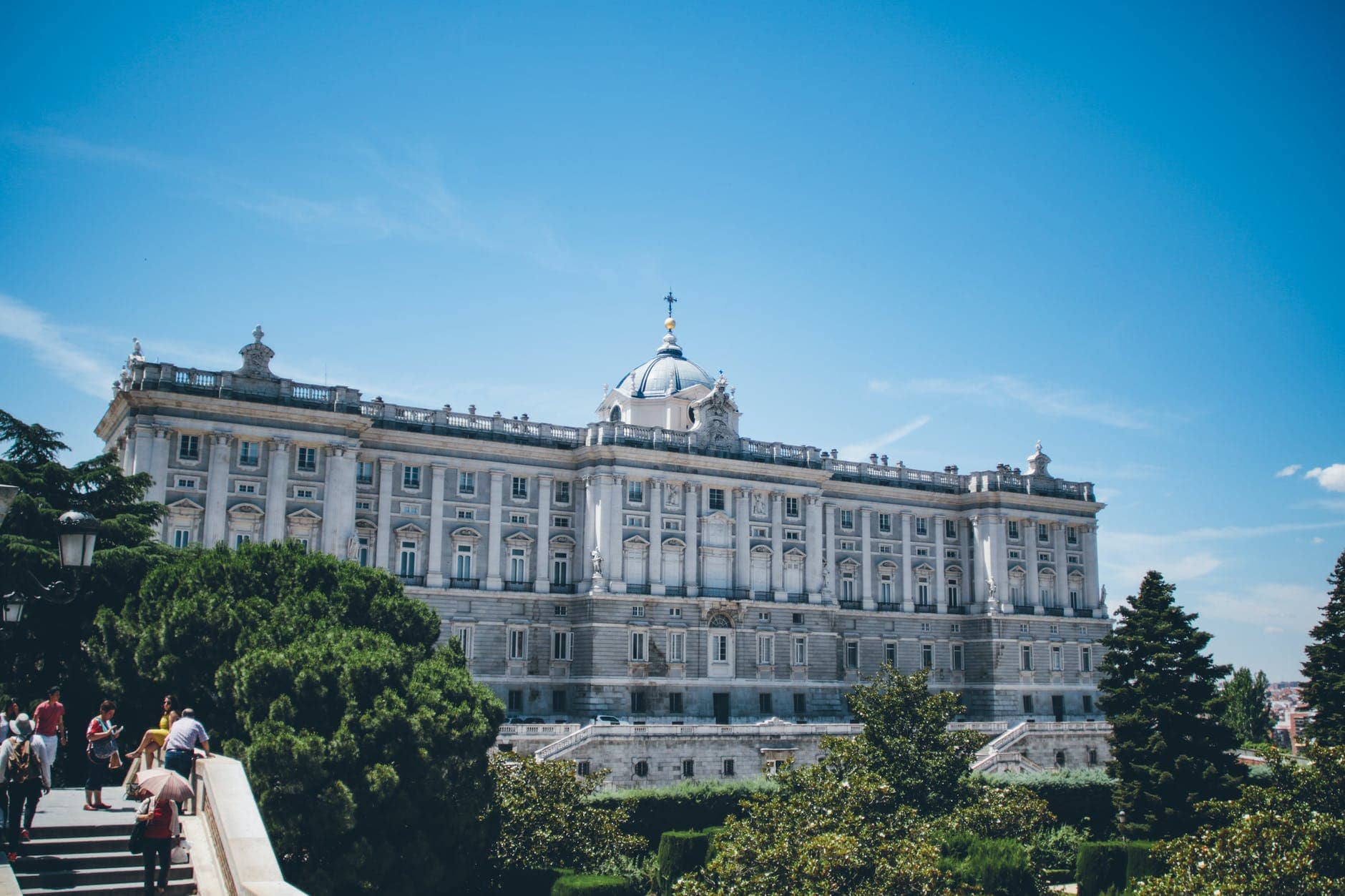 Explore Madrid view of royal palace in spain under a blue sky